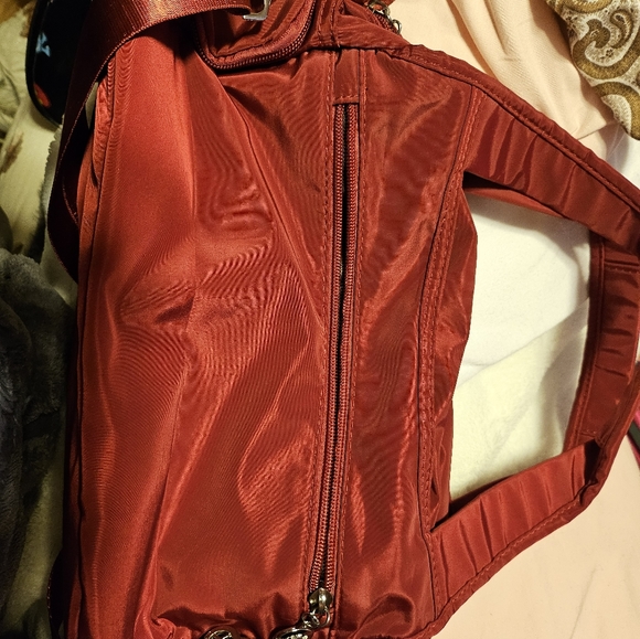 A small shoulder or crossbody purse with a ton of pockets to carry everything! - Picture 3 of 15